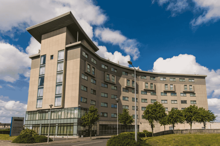 Aspect Hotel Park West exterior on a sunny day