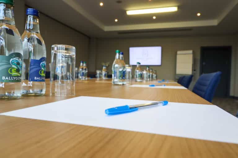 Aspect Hotel Park West Boardroom Table Close Up of writing equipment